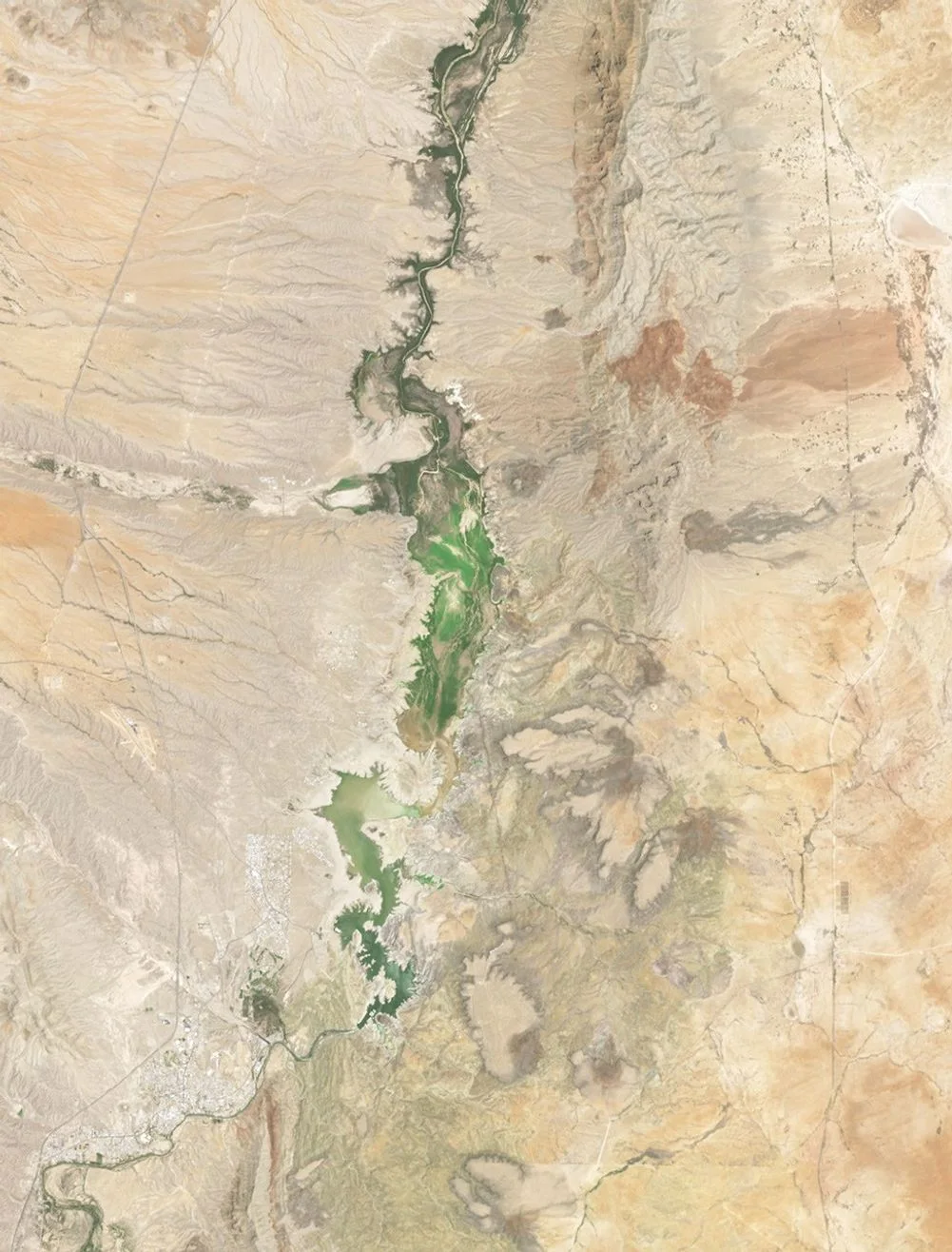 Satellite view of Elephant Butte Reservoir on July 27, 2026, with much less water and large areas of exposed basin.