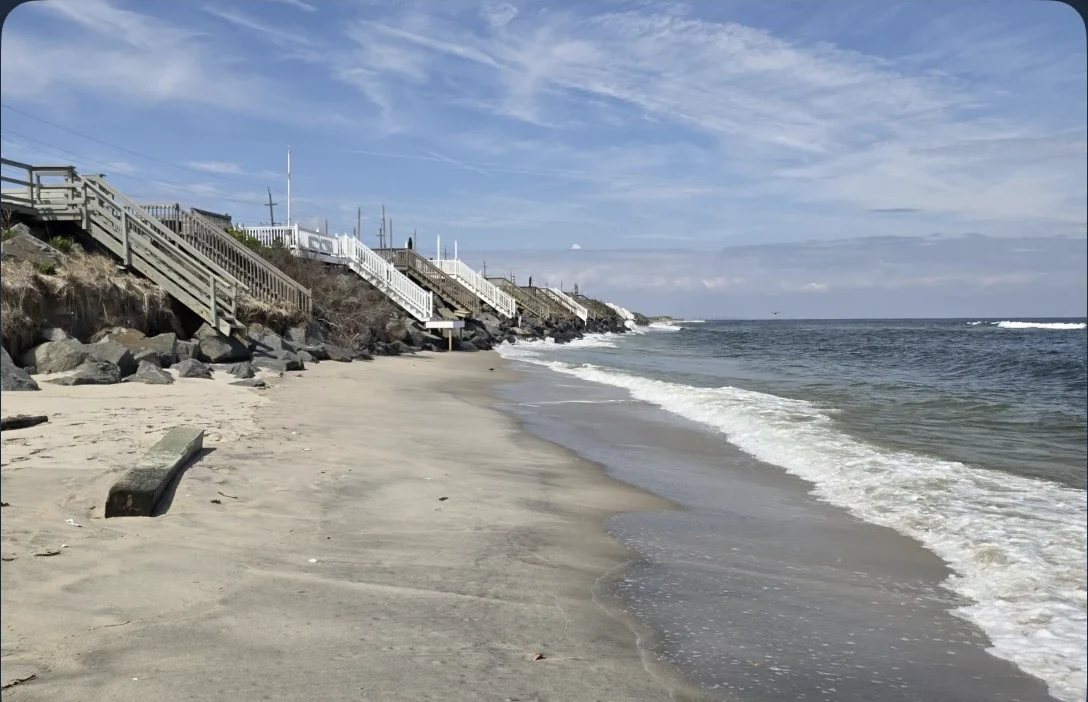 A contributed photograph of a sandy beach and shoreline.